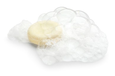 Photo of Round soap with foam on white background