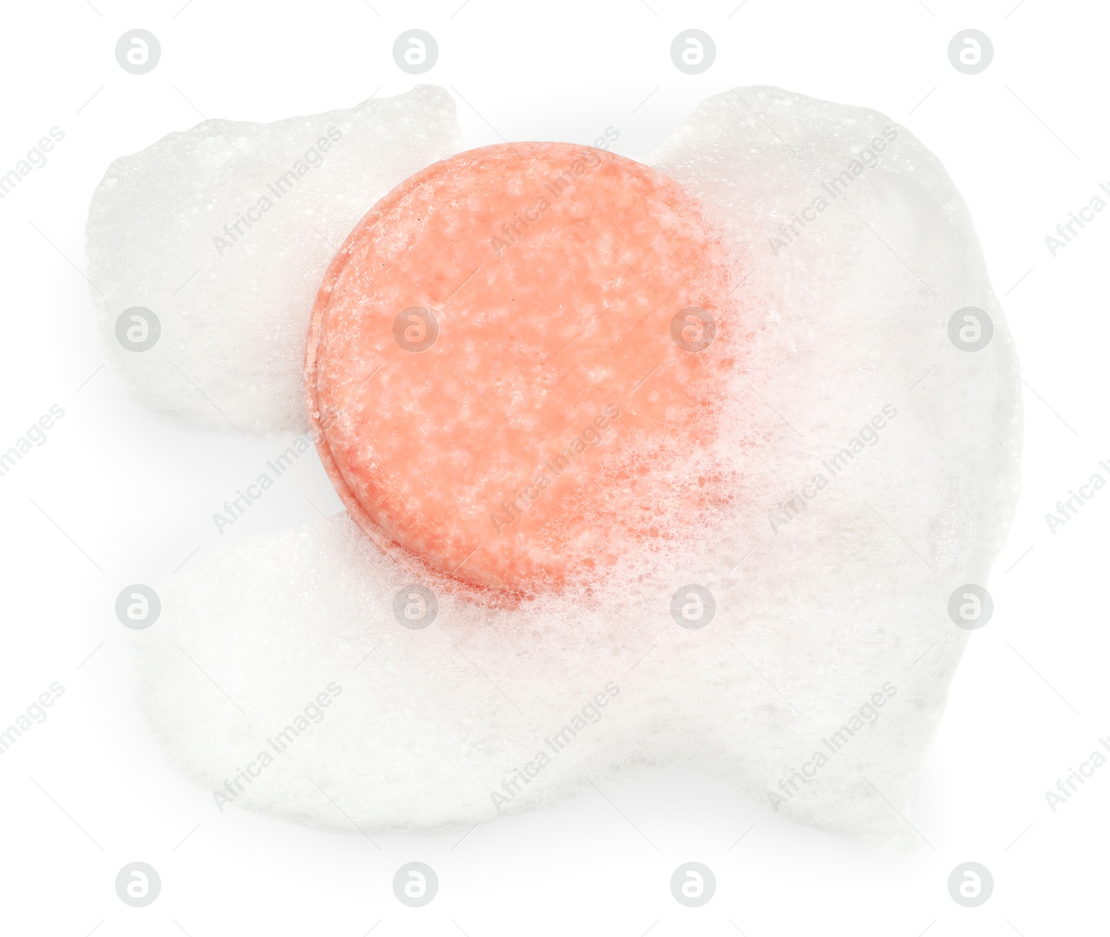 Photo of Pink soap with foam on white background, top view