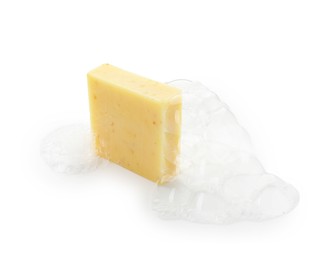 Photo of Yellow soap with foam on white background