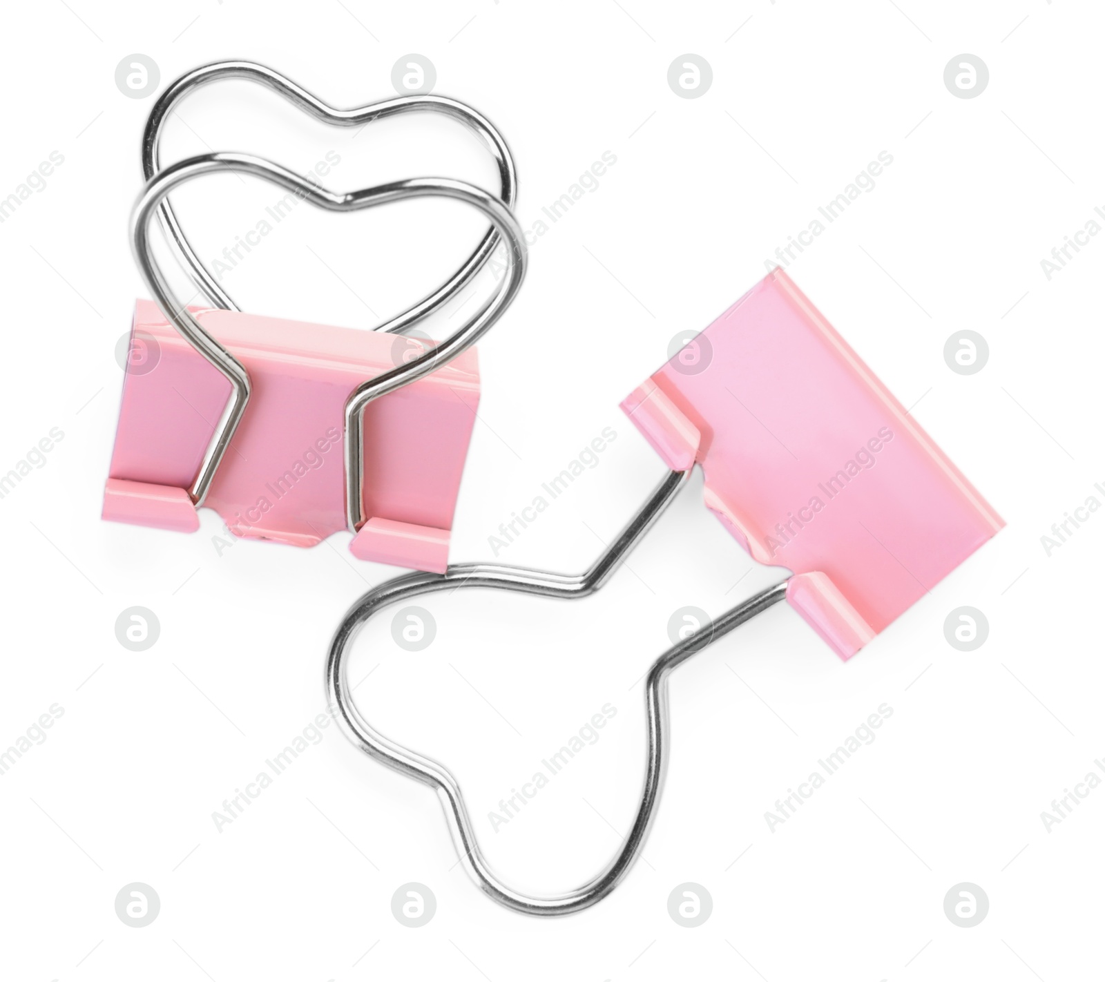 Photo of Heart shaped binder clips isolated on white, top view