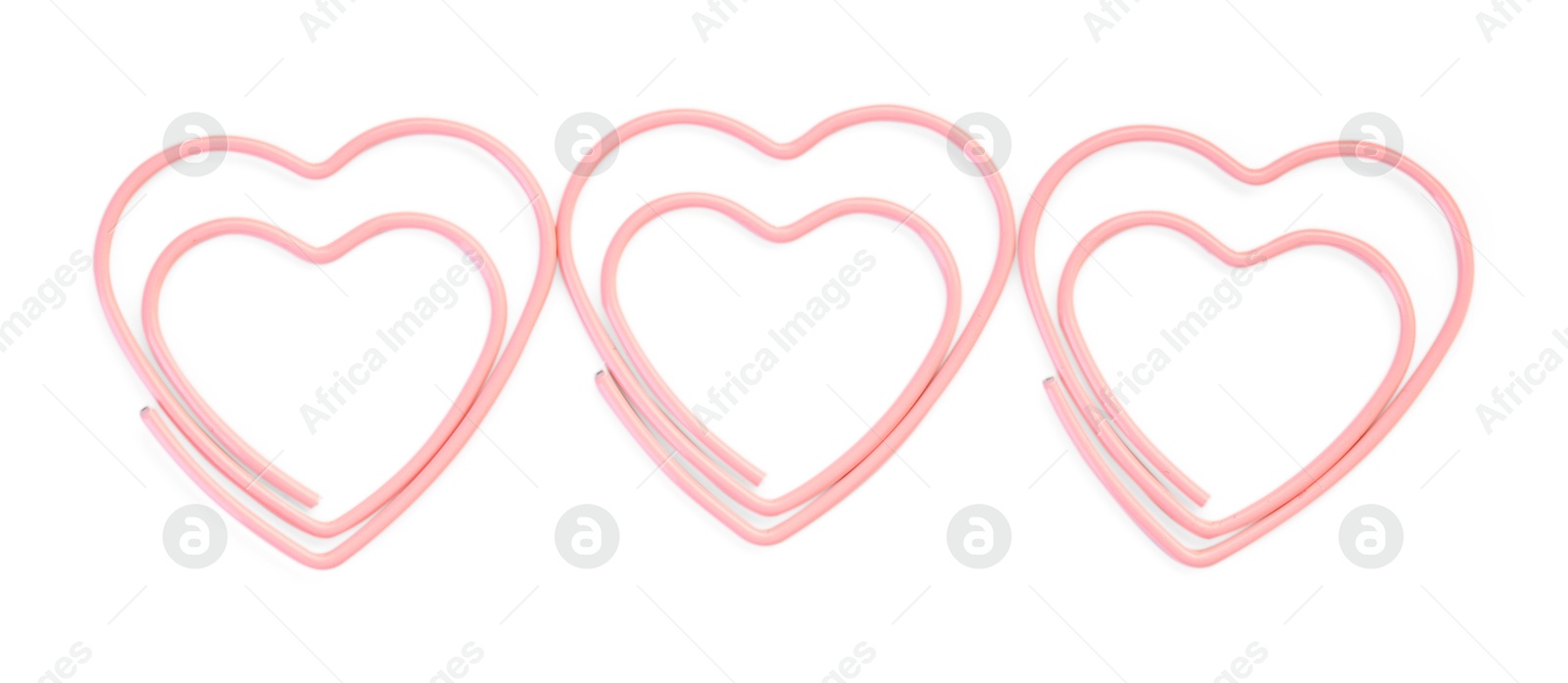 Photo of Heart shaped paper clips isolated on white, top view