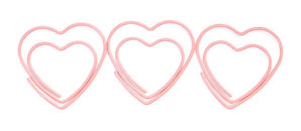 Photo of Heart shaped paper clips isolated on white, top view