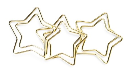 Photo of Star shaped paper clips isolated on white, top view