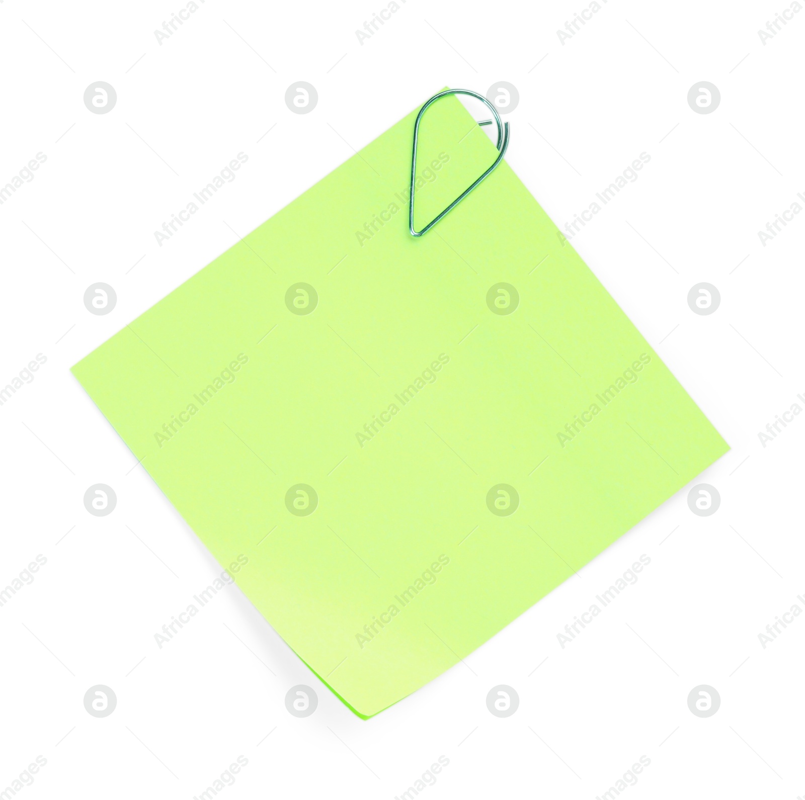 Photo of Blank paper note attached with clip isolated on white, top view