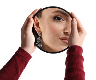 Image of Beautiful woman looking in small round mirror on white background, closeup