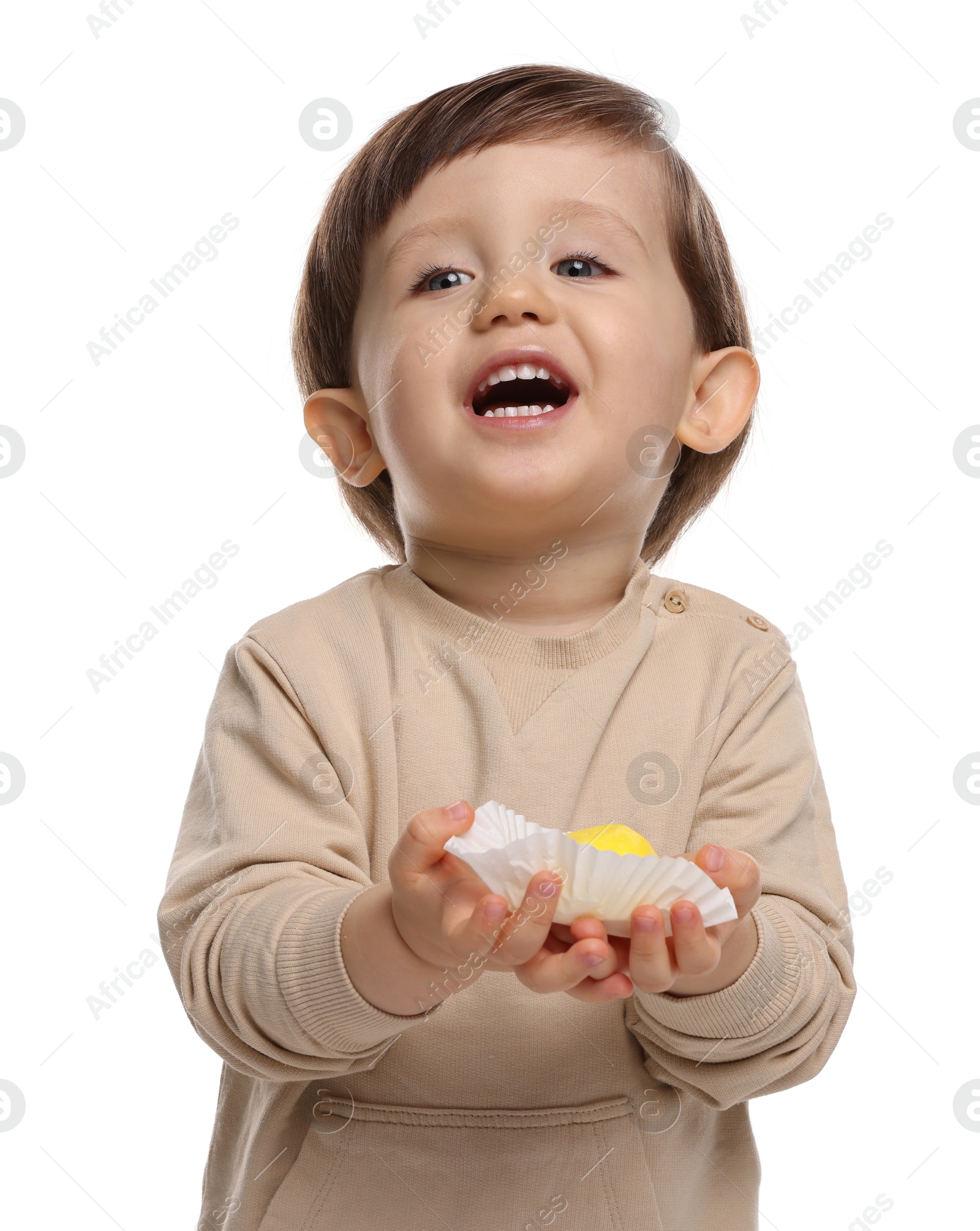 Photo of Cute little child with tasty mochi on white background