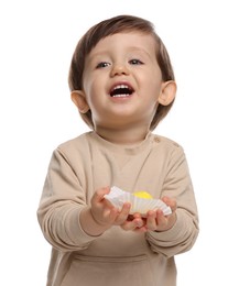 Photo of Cute little child with tasty mochi on white background