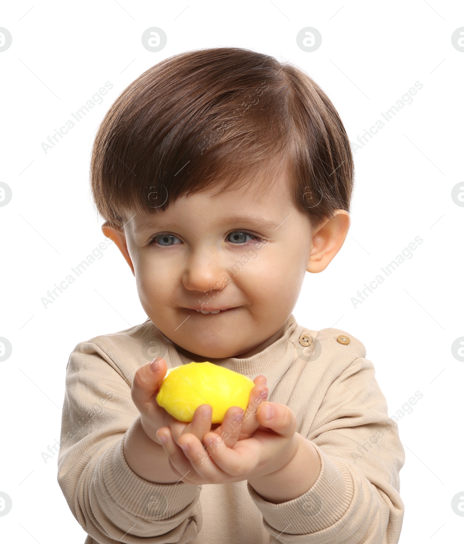 Photo of Cute little child with tasty mochi on white background