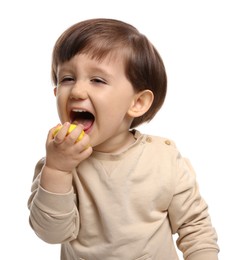 Photo of Cute little child eating tasty mochi on white background