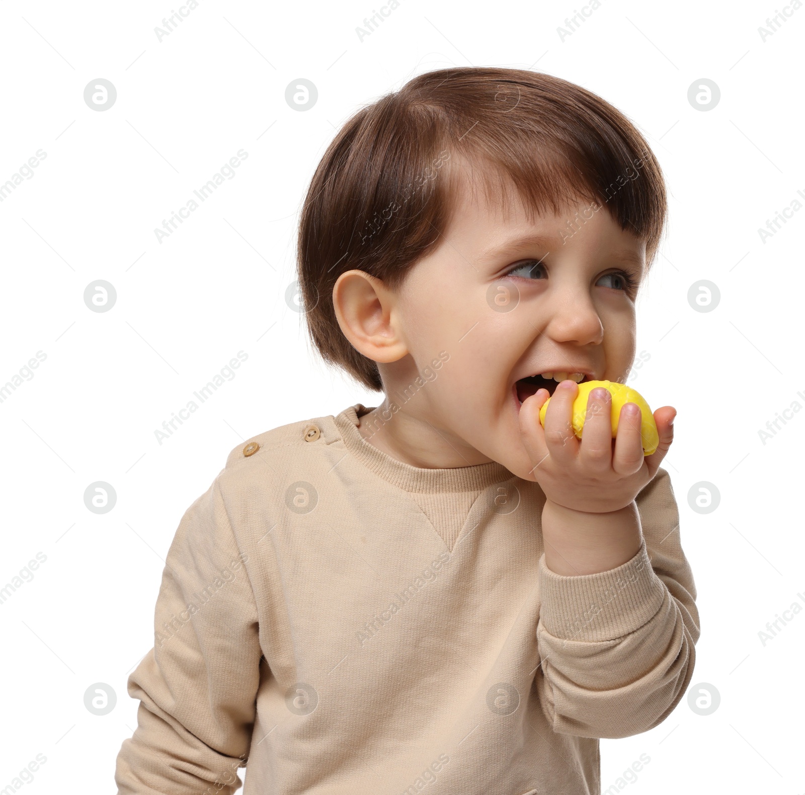 Photo of Cute little child eating tasty mochi on white background