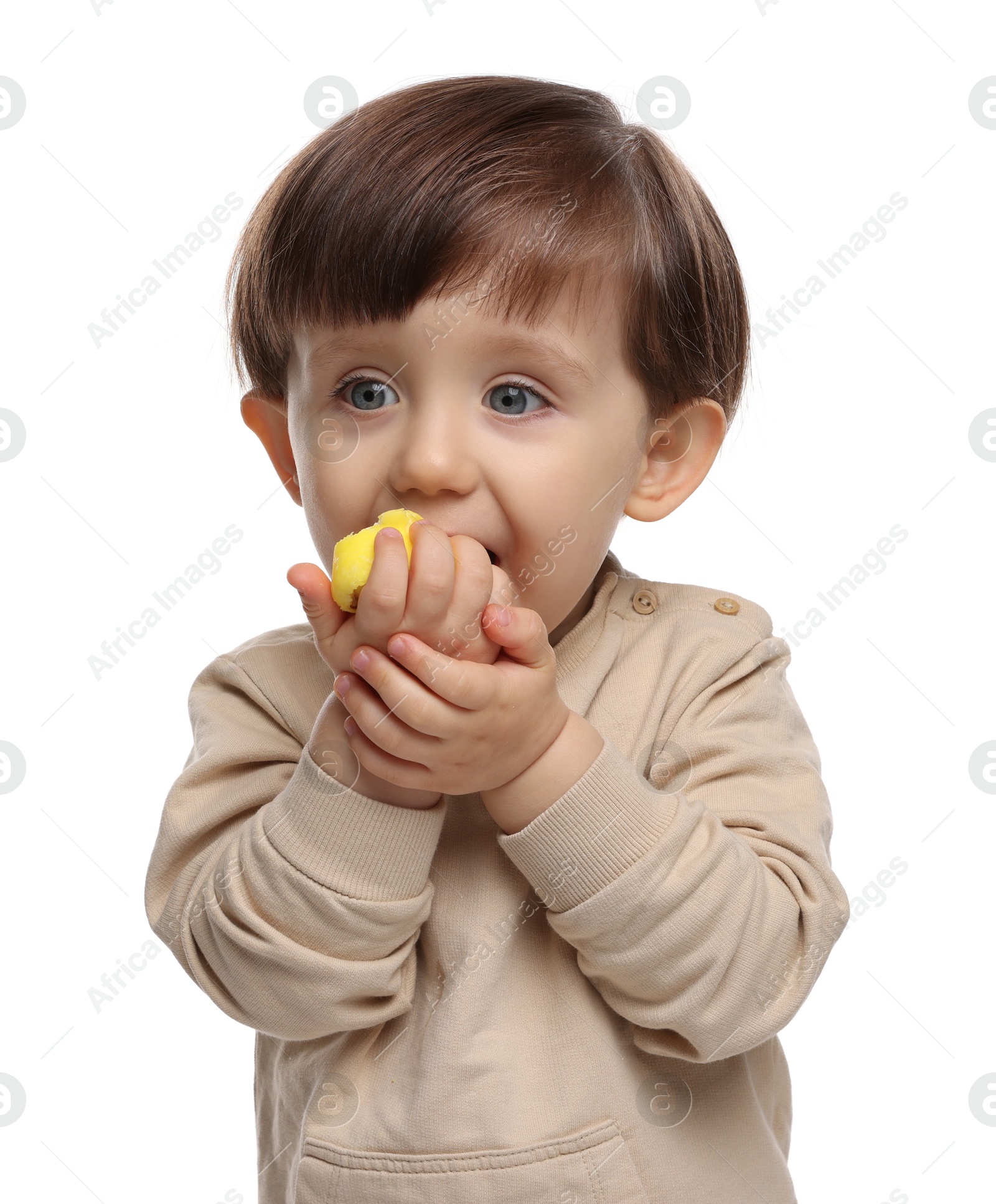 Photo of Cute little child eating tasty mochi on white background