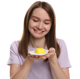 Photo of Woman with tasty mochi on white background