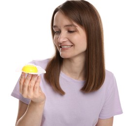 Photo of Woman with tasty mochi on white background