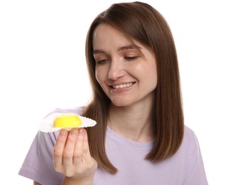 Photo of Woman with tasty mochi on white background