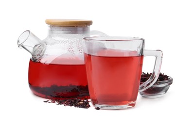 Photo of Tasty hibiscus tea in glass cup and teapot isolated on white