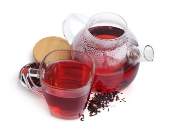 Photo of Tasty hibiscus tea in glass cup and teapot isolated on white