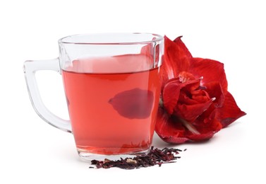 Photo of Tasty hibiscus tea in glass cup and flower isolated on white