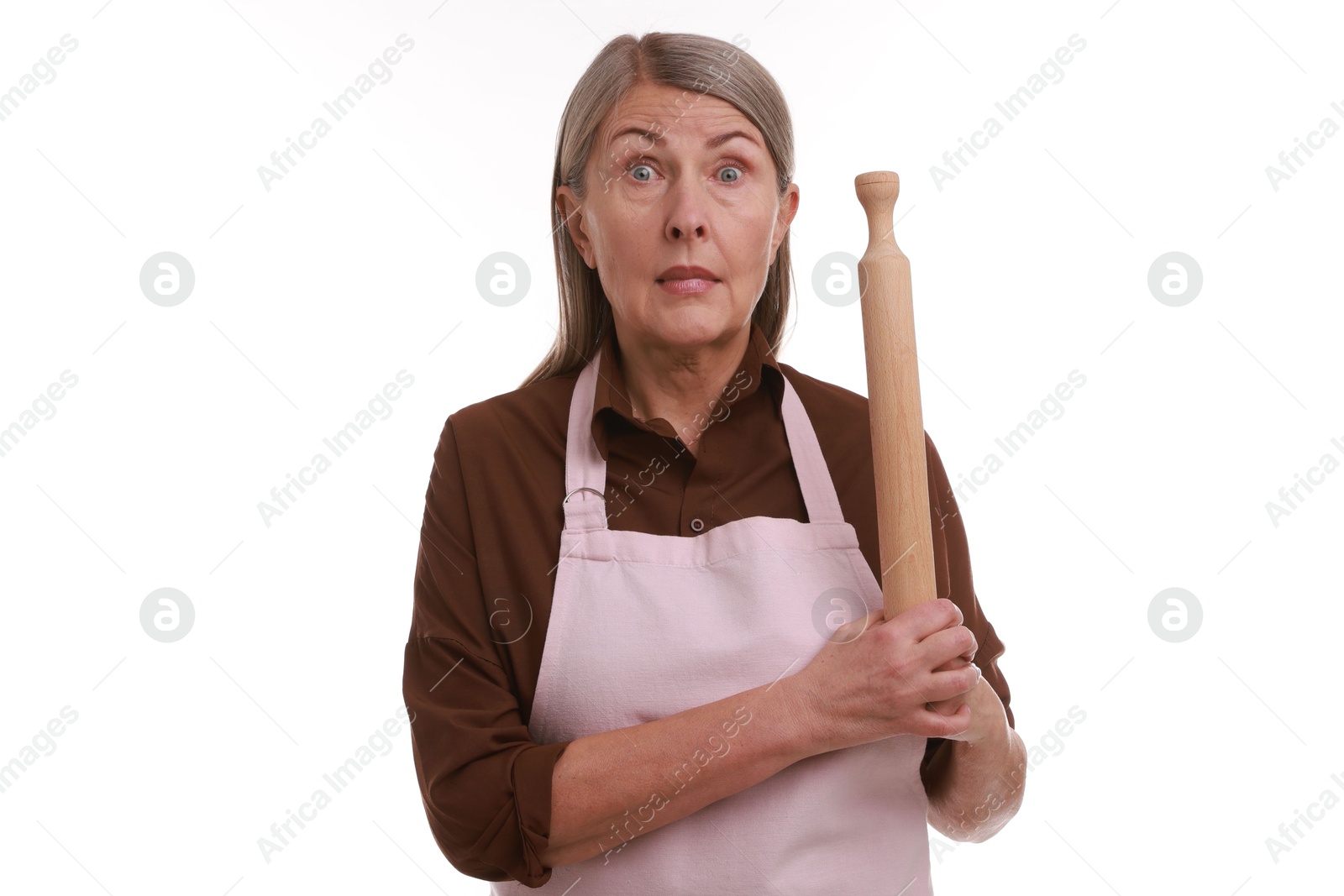 Photo of Surprised woman with rolling pin on white background