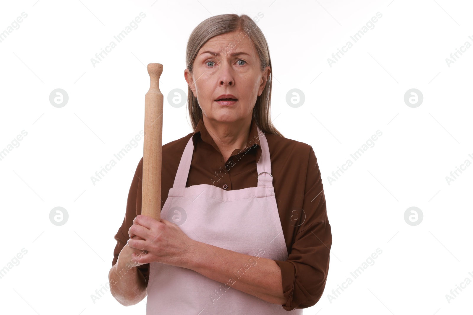 Photo of Surprised woman with rolling pin on white background