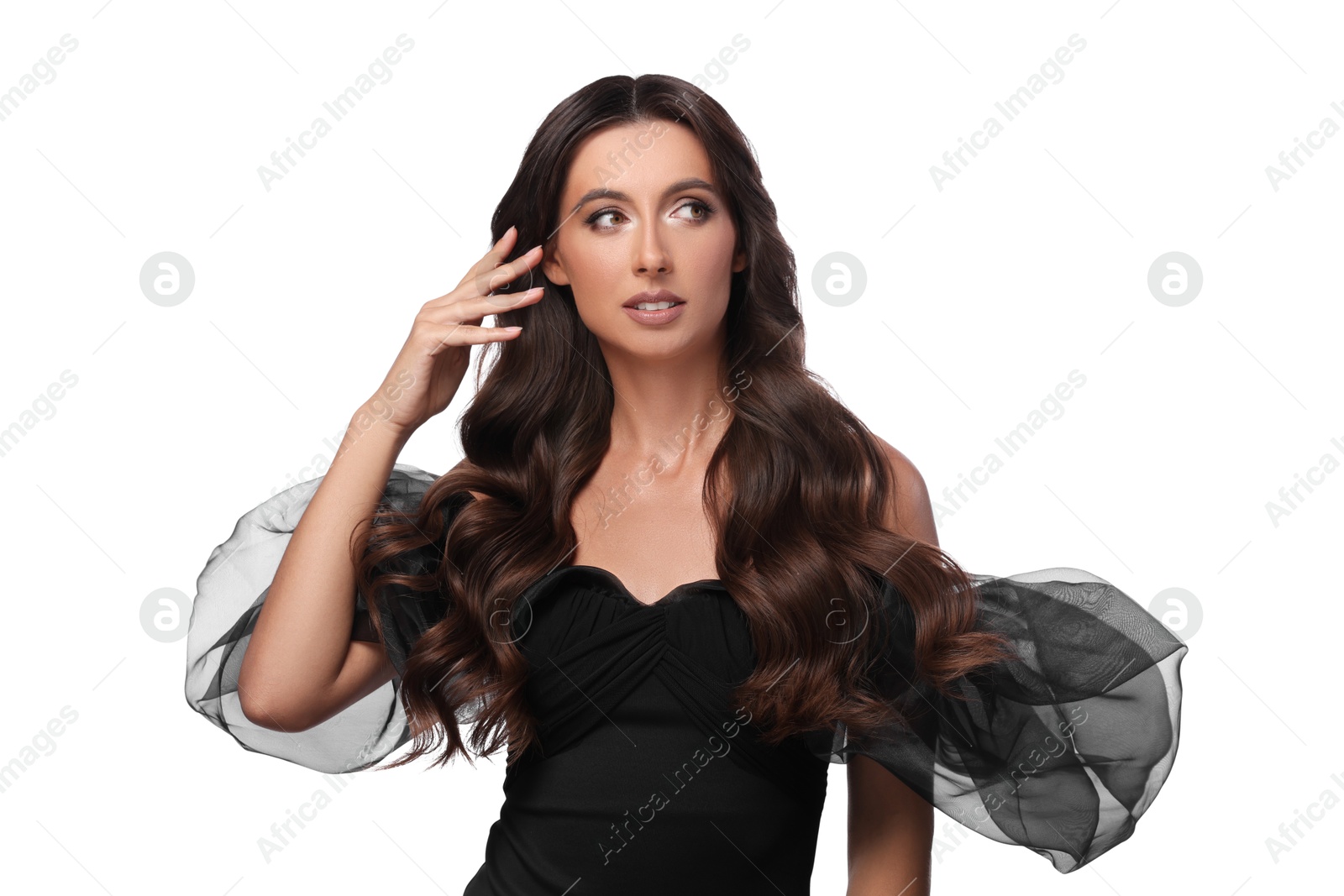 Photo of Hair styling. Beautiful woman with wavy long hair on white background