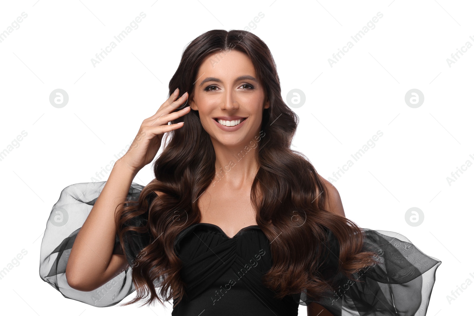 Photo of Hair styling. Portrait of beautiful woman with wavy long hair on white background