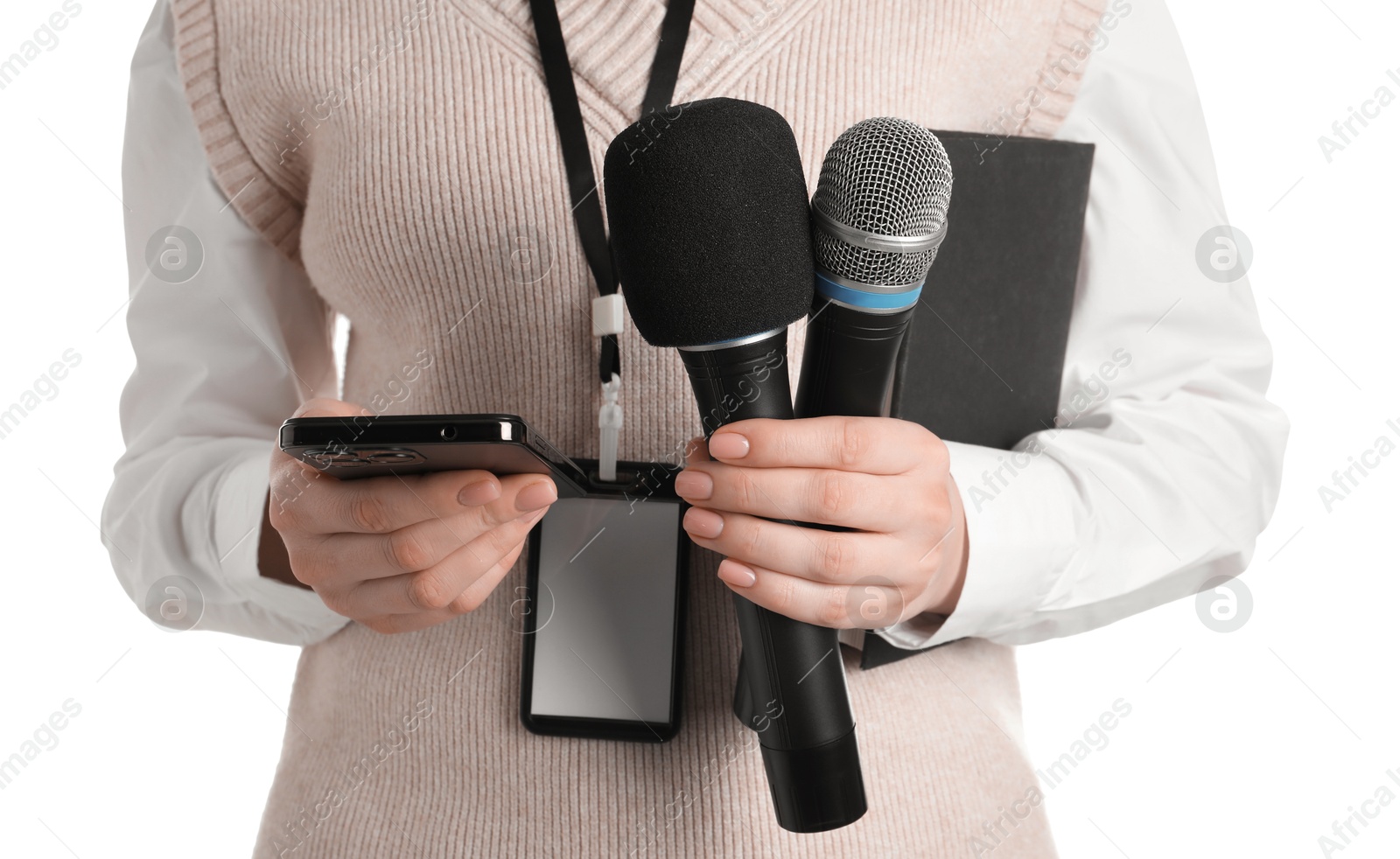 Photo of Journalist with microphones, smartphone and notebook on white background, closeup