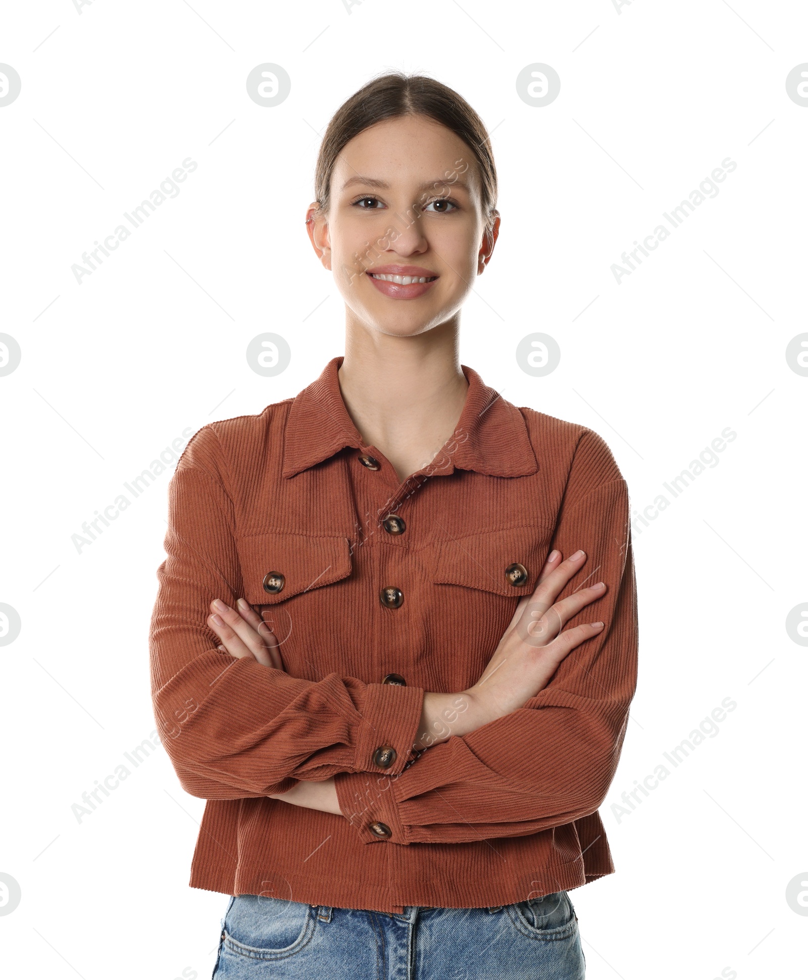 Photo of Portrait of smiling teenage girl with crossed arms on white background