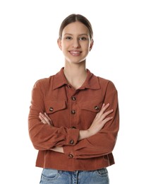 Photo of Portrait of smiling teenage girl with crossed arms on white background