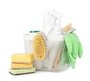 Photo of Eco-friendly cleaning products and supplies in basket isolated on white