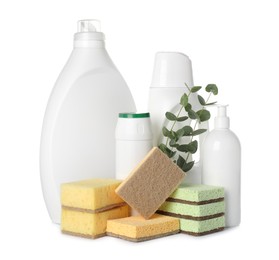 Photo of Eco-friendly cleaning products, sponges and eucalyptus branches isolated on white