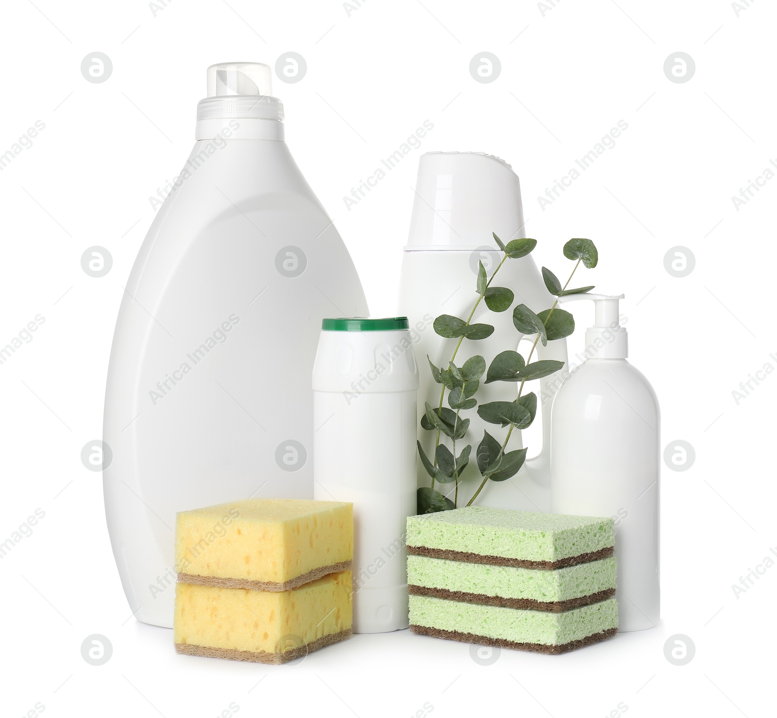 Photo of Eco-friendly cleaning products, sponges and eucalyptus branches isolated on white