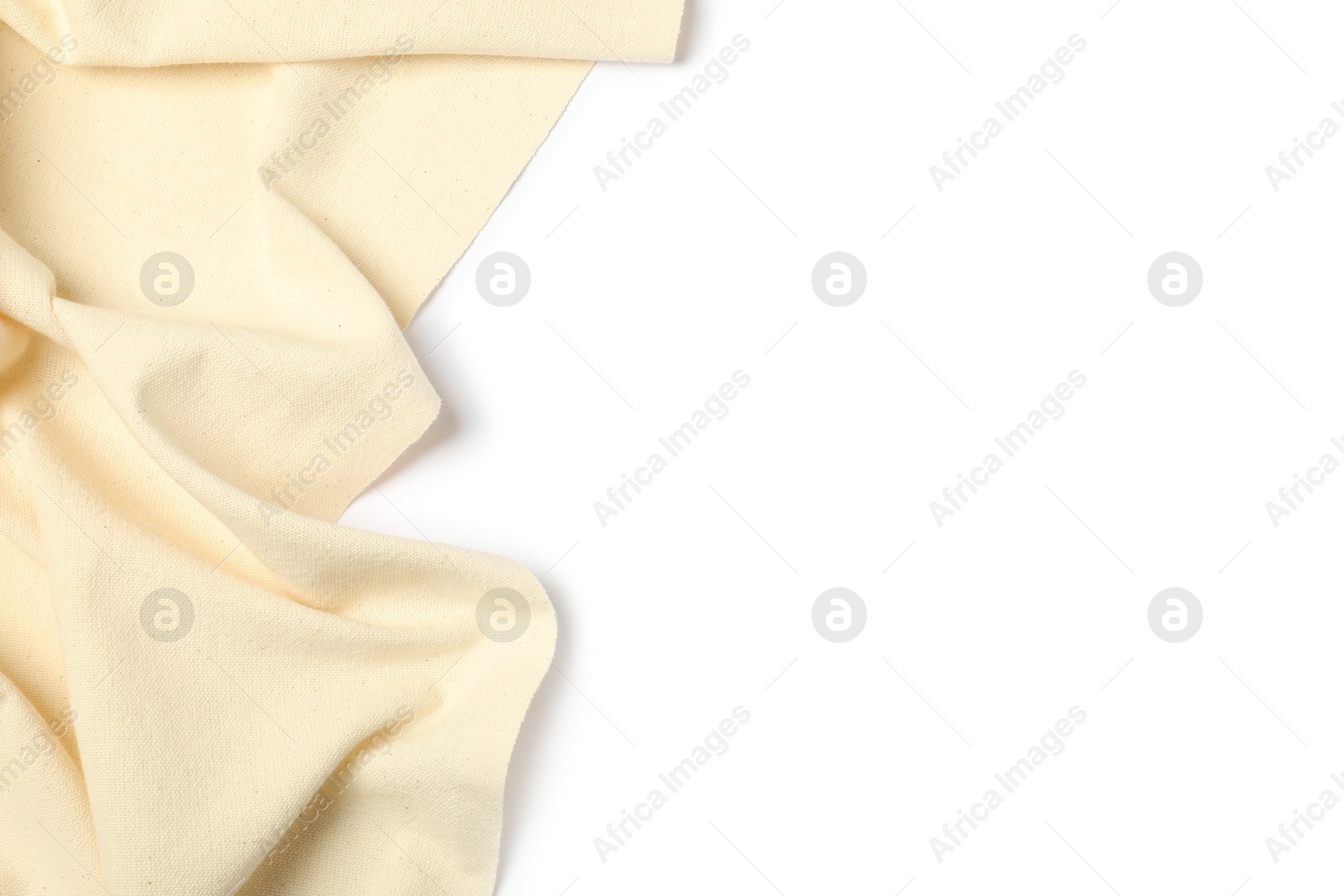 Photo of Beige tablecloth isolated on white, top view