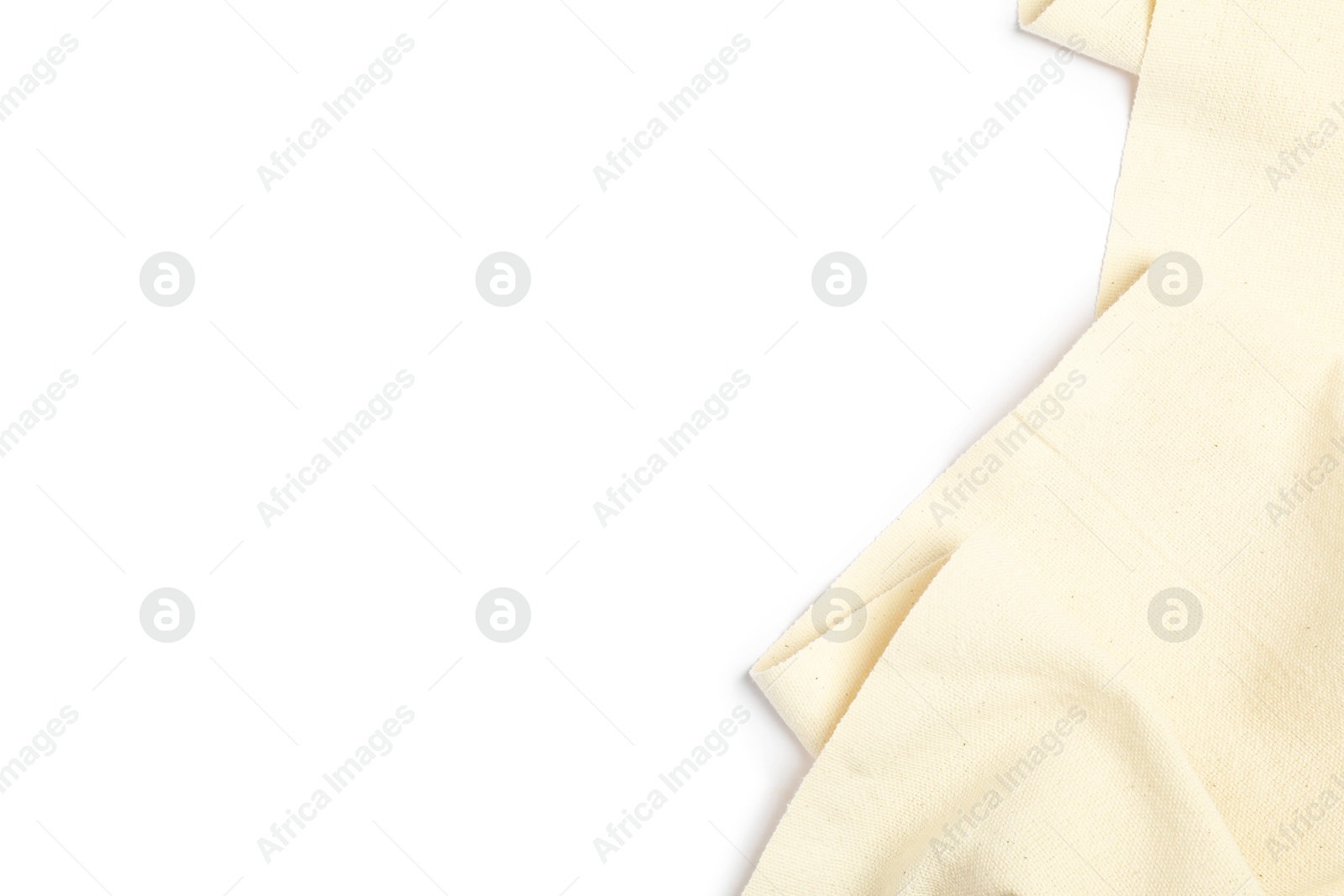 Photo of Beige tablecloth isolated on white, top view