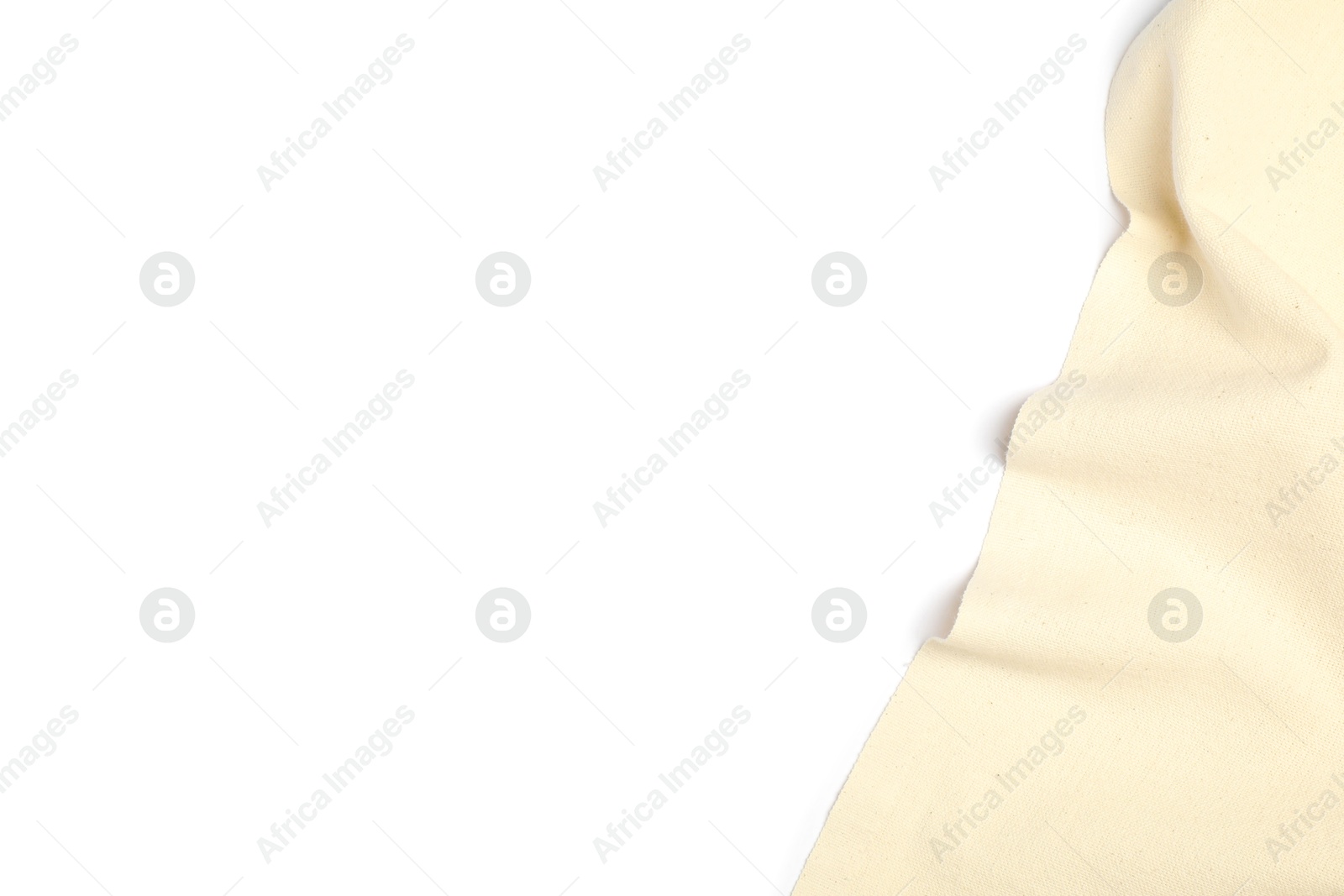 Photo of Beige tablecloth isolated on white, top view