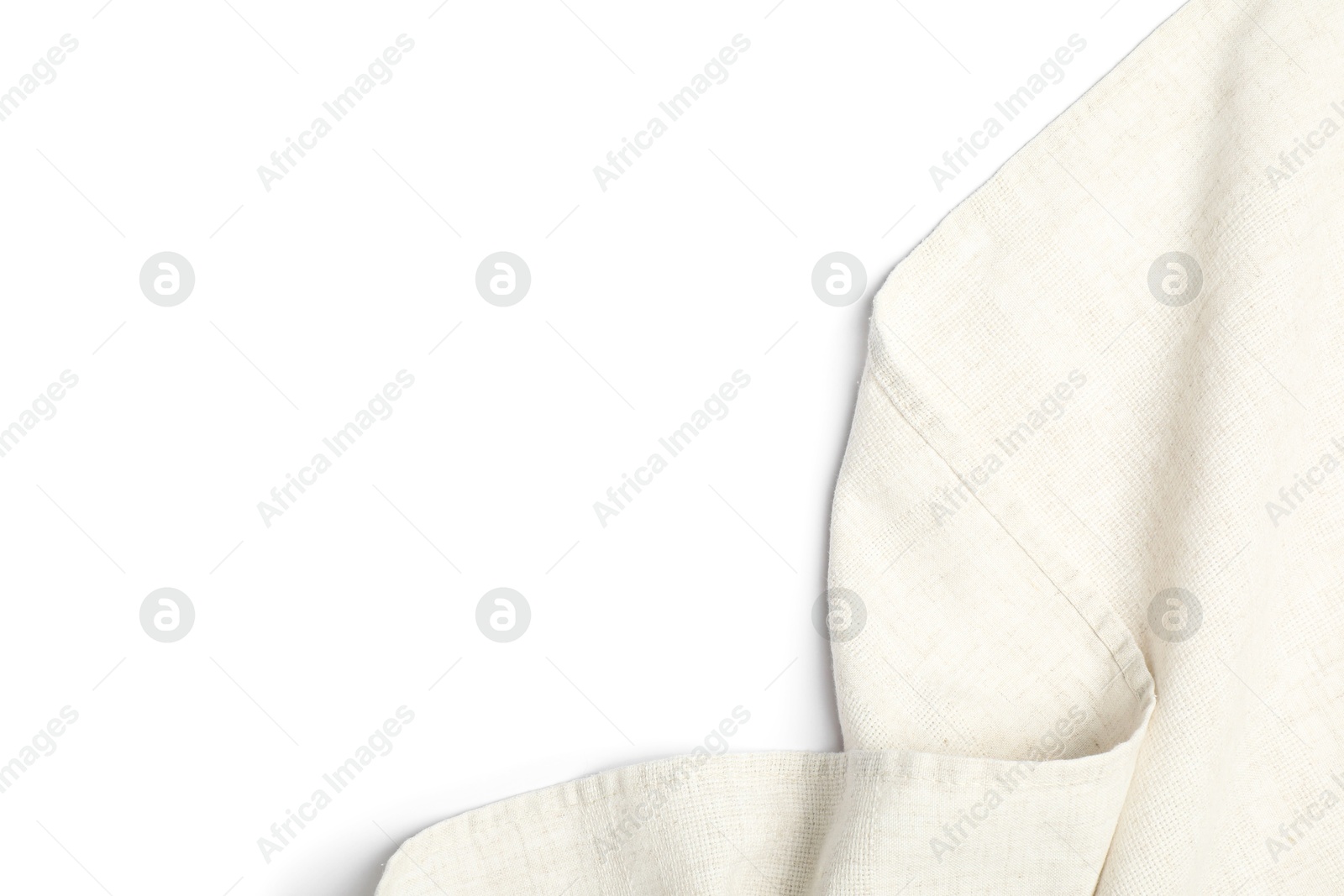 Photo of Beige tablecloth isolated on white, top view