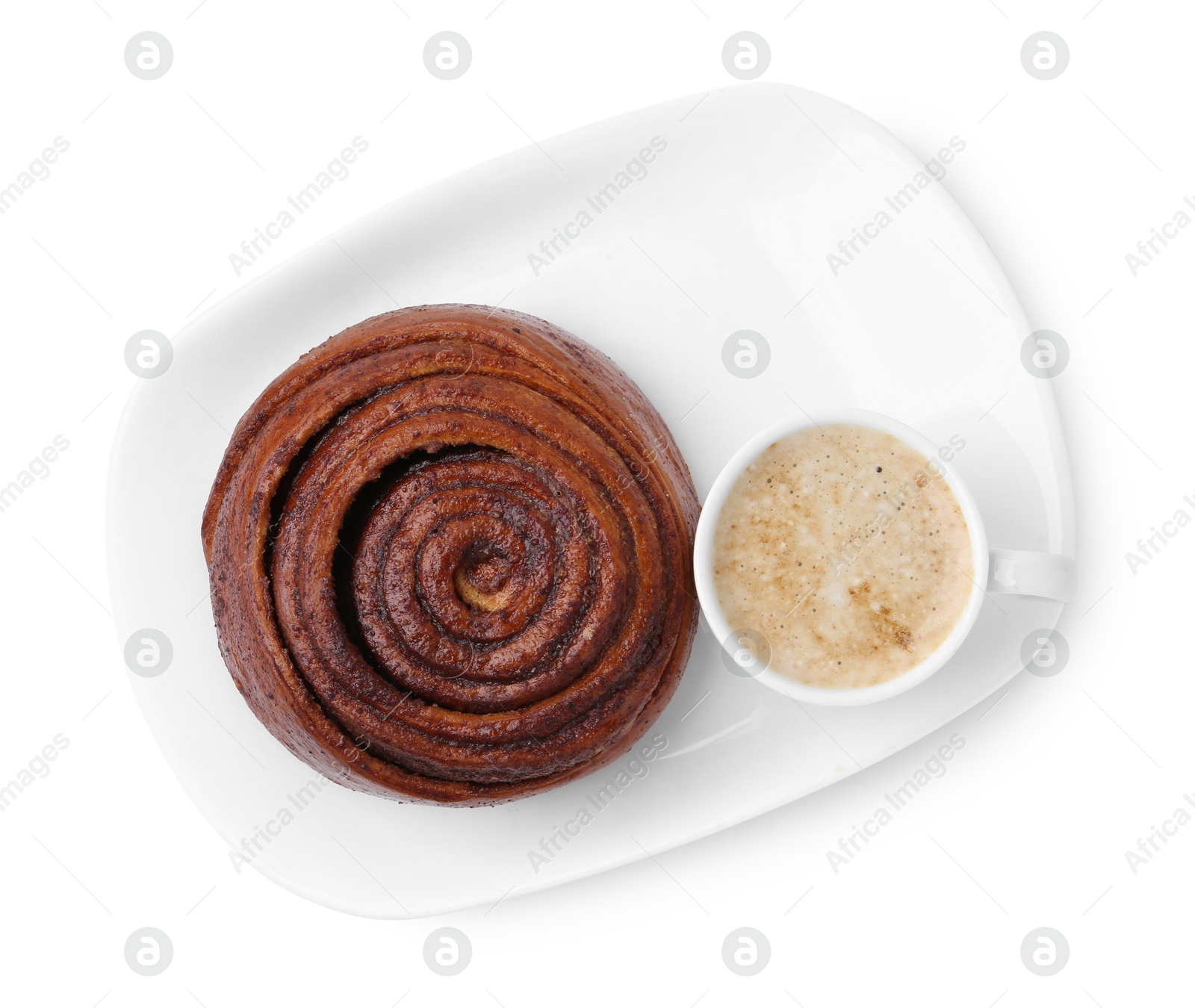 Photo of Delicious cinnamon roll and cup of coffee isolated on white, top view