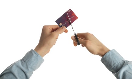 Photo of Woman cutting credit card on white background, closeup