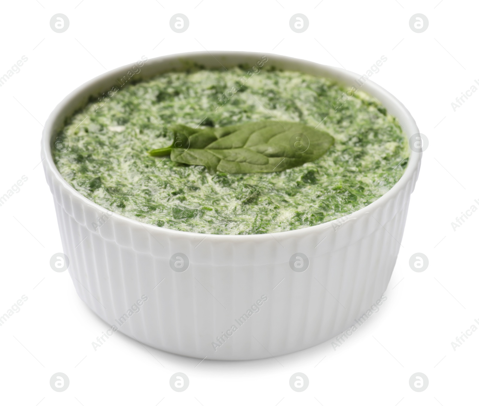 Photo of Delicious spinach sauce in bowl isolated on white