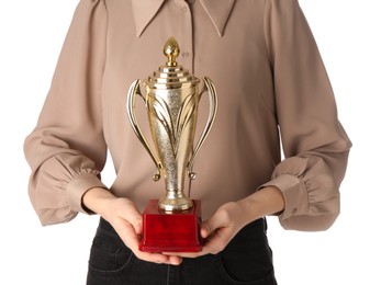 Photo of Woman with golden trophy cup on white background, closeup