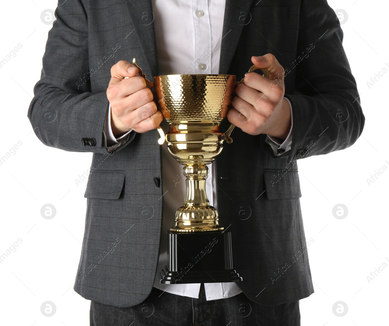 Photo of Man with golden trophy cup on white background, closeup