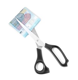 Photo of Scissors with euro banknote isolated on white, top view