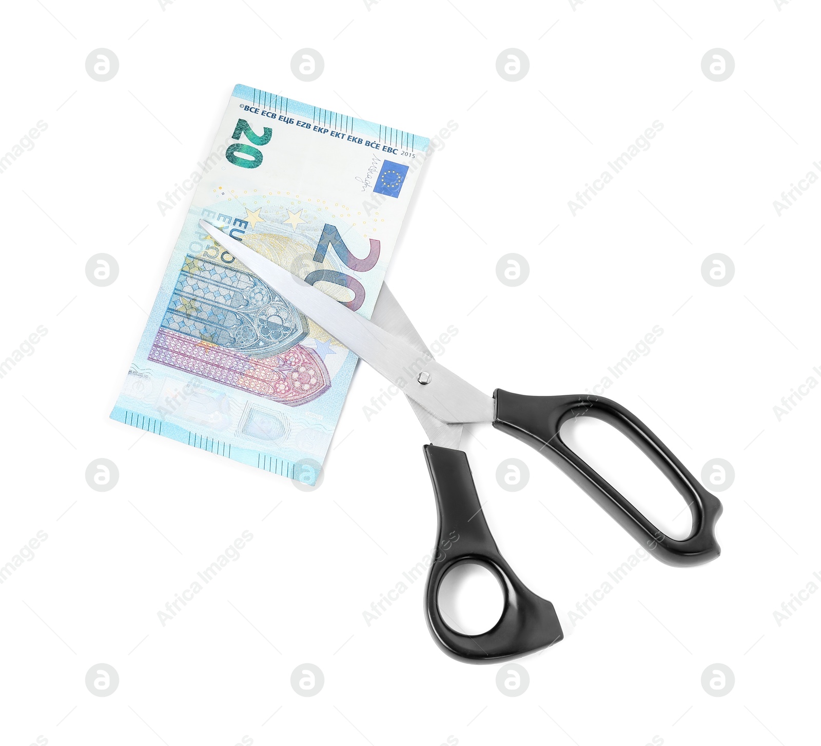 Photo of Scissors with euro banknote isolated on white, top view