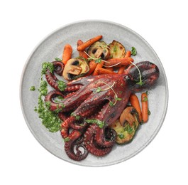 Photo of Roasted octopus with vegetables and mushrooms isolated on white, top view