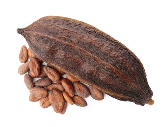 Photo of Cocoa pod and beans isolated on white, top view