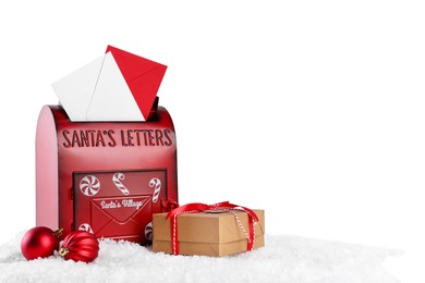 Photo of Santa Claus mail box with letters, gift and Christmas baubles on artificial snow against white background, space for text