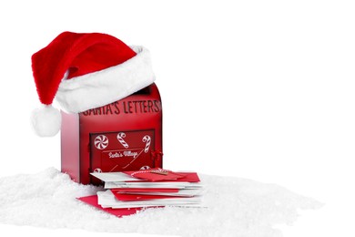 Photo of Santa Claus mail box with hat and letters on artificial snow against white background, space for text. Christmas tradition