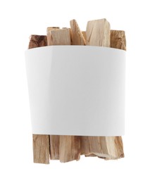 Photo of Palo santo sticks wrapped in paper on white background