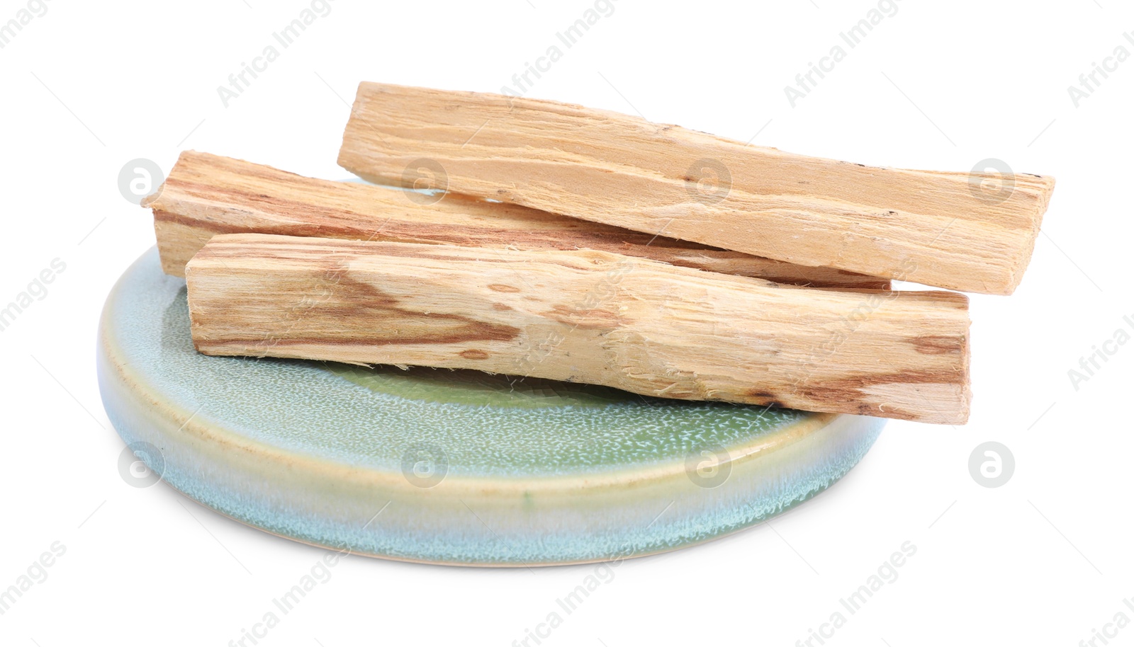 Photo of Three palo santo sticks on white background