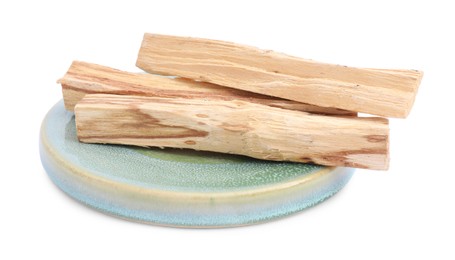 Photo of Three palo santo sticks on white background