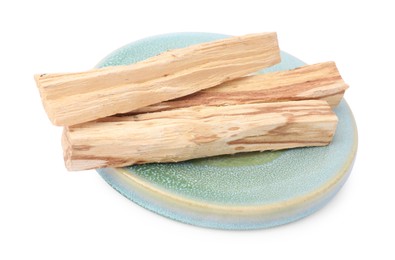 Photo of Three palo santo sticks on white background